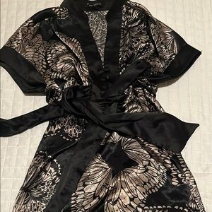 Elegant Black and Cream Satin Blouse